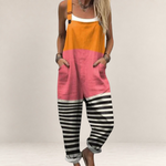 Valvet Oak House Antigoni color-blocked jumpsuit with orange, pink, and black-and-white striped wide-leg trousers.