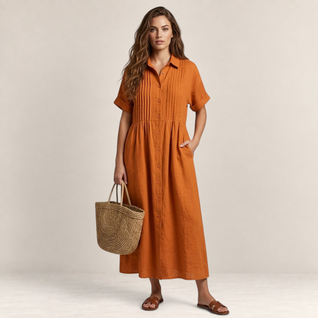 Valvet Oak House orange cotton midi shirt dress with button-down front and pleat details worn by a woman with a bag
