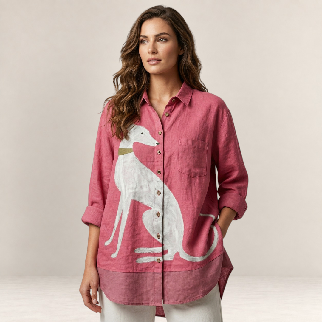 Valvet Oak House Hera pink linen button-down shirt with a white greyhound dog print worn by a woman