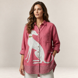 Valvet Oak House Hera pink linen button-down shirt with a white greyhound dog print worn by a woman