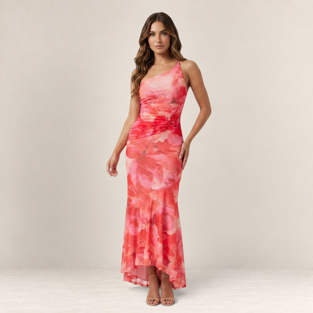 Valvet Oak House Melina floral print maxi dress with one-shoulder pleated detail and asymmetrical hem on a model.