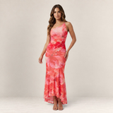 Valvet Oak House Melina floral print maxi dress with one-shoulder pleated detail and asymmetrical hem on a model.