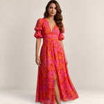 Valvet Oak House Elena maxi dress in pink and orange floral print with deep V-neck, puff sleeves, and front slit.