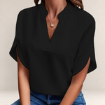 Valvet Oak House Agatha black blouse with a structured collar and short sleeves worn with blue jeans