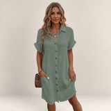 Valvet Oak House sage green button-down shirt dress with short sleeves and pockets on a model