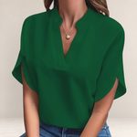 Valvet Oak House Agatha elegant emerald green blouse with a structured collar and short split sleeves