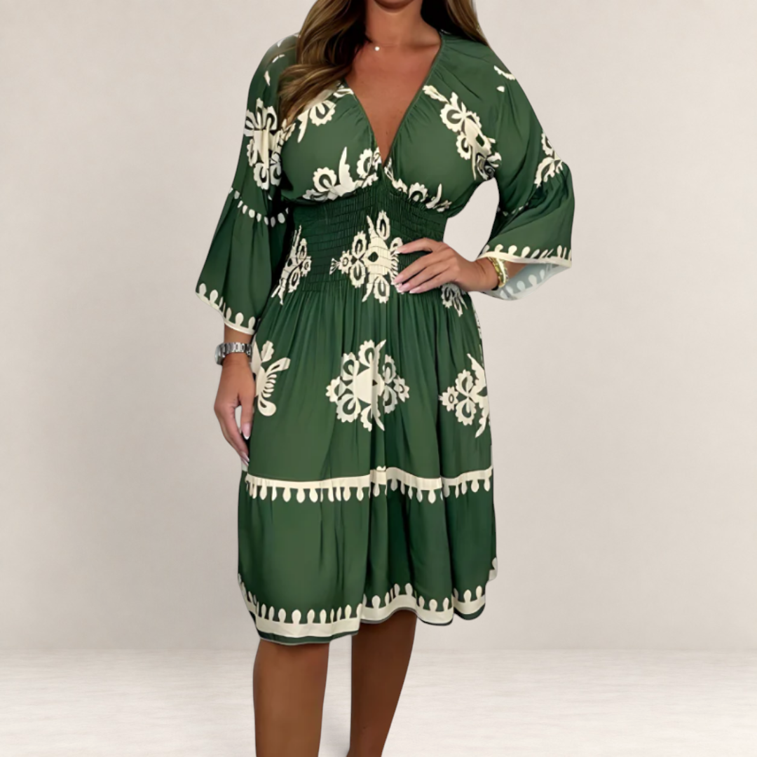Valvet Oak House green boho midi dress with white floral print, V-neckline, and smocked waist on a model.