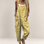 Valvet Oak House yellow printed jumpsuit with bee pattern, featuring wide legs, adjustable straps, and side pockets.