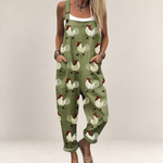 Valvet Oak House olive green printed jumpsuit with rooster pattern, loose fit, wide legs, and adjustable straps.
