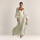 Valvet Oak House romantic cream maxi dress with sheer puff sleeves and a flowing, lightweight silhouette.