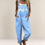 Valvet Oak House light blue loose-fit dungaree jumpsuit with a heart-shaped wave print and adjustable straps