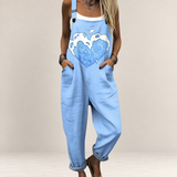 Valvet Oak House light blue loose-fit dungaree jumpsuit with a heart-shaped wave print and adjustable straps