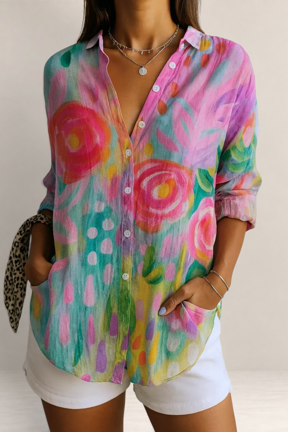Valvet Oak House Pietra button-down shirt with vibrant pink, yellow, and teal floral abstract print and pockets.