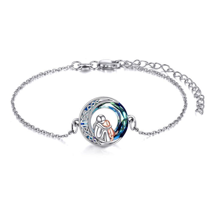 Úprava náramkových hodinek se stříbrným talismanem psa 925