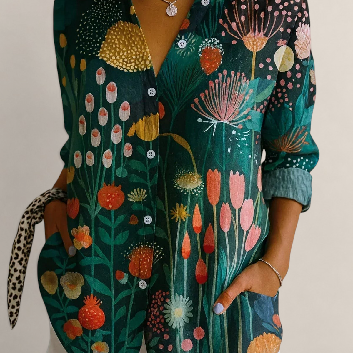 Valvet Oak House Pietra shirt featuring a vibrant green botanical print with colorful floral patterns and button front