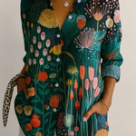 Valvet Oak House Pietra shirt featuring a vibrant green botanical print with colorful floral patterns and button front