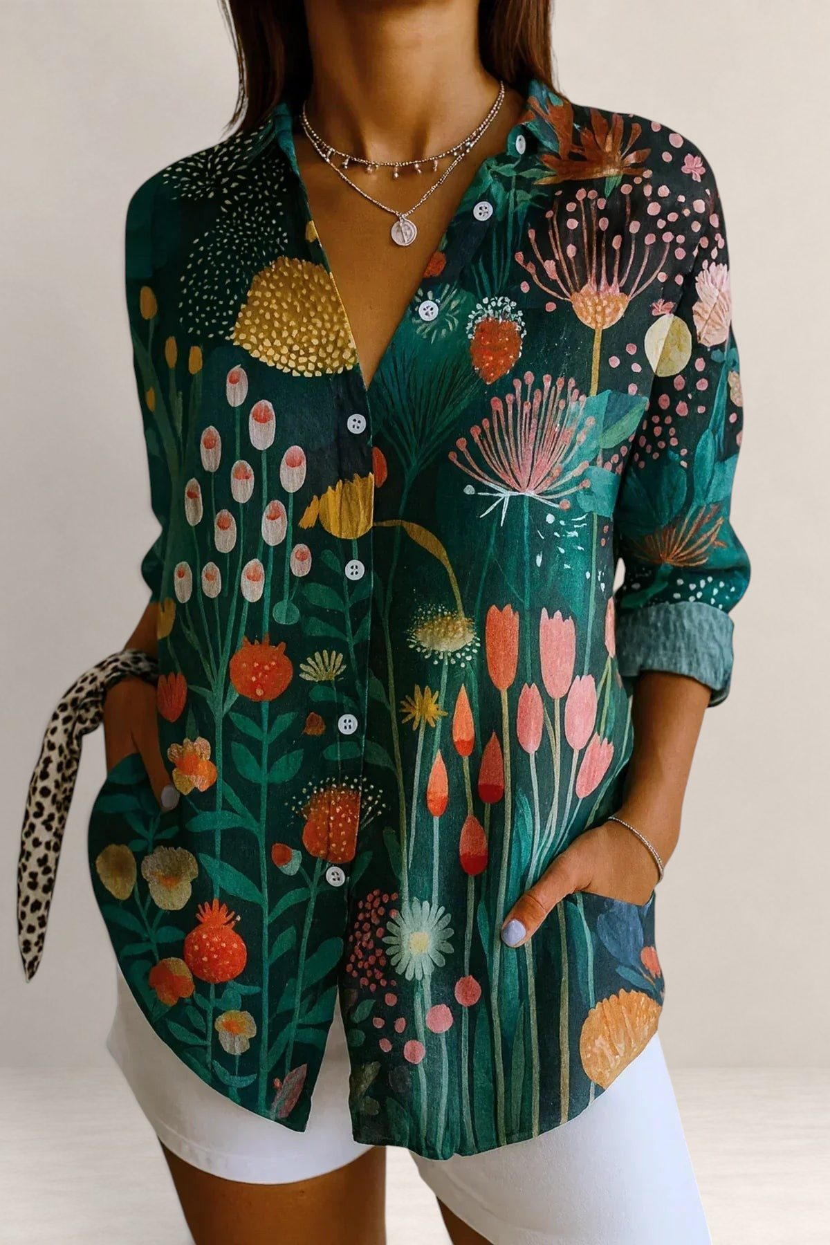 Valvet Oak House Pietra shirt featuring a vibrant green botanical print with colorful floral patterns and button front