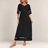 Valvet Oak House black midi dress with empire waist, sheer mesh sleeve details, and a flowing, breathable silhouette.