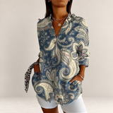Valvet Oak House blue paisley print button-down shirt with long sleeves and front pockets on a model