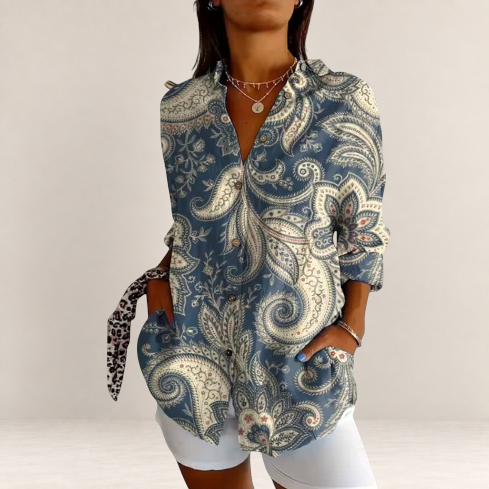 Valvet Oak House blue paisley print button-down shirt with long sleeves and front pockets on a model