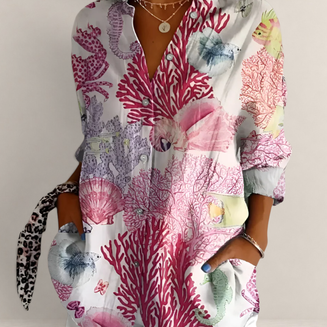 Valvet Oak House white button-down blouse with pink and blue coral reef print, V-neck, and long sleeves.