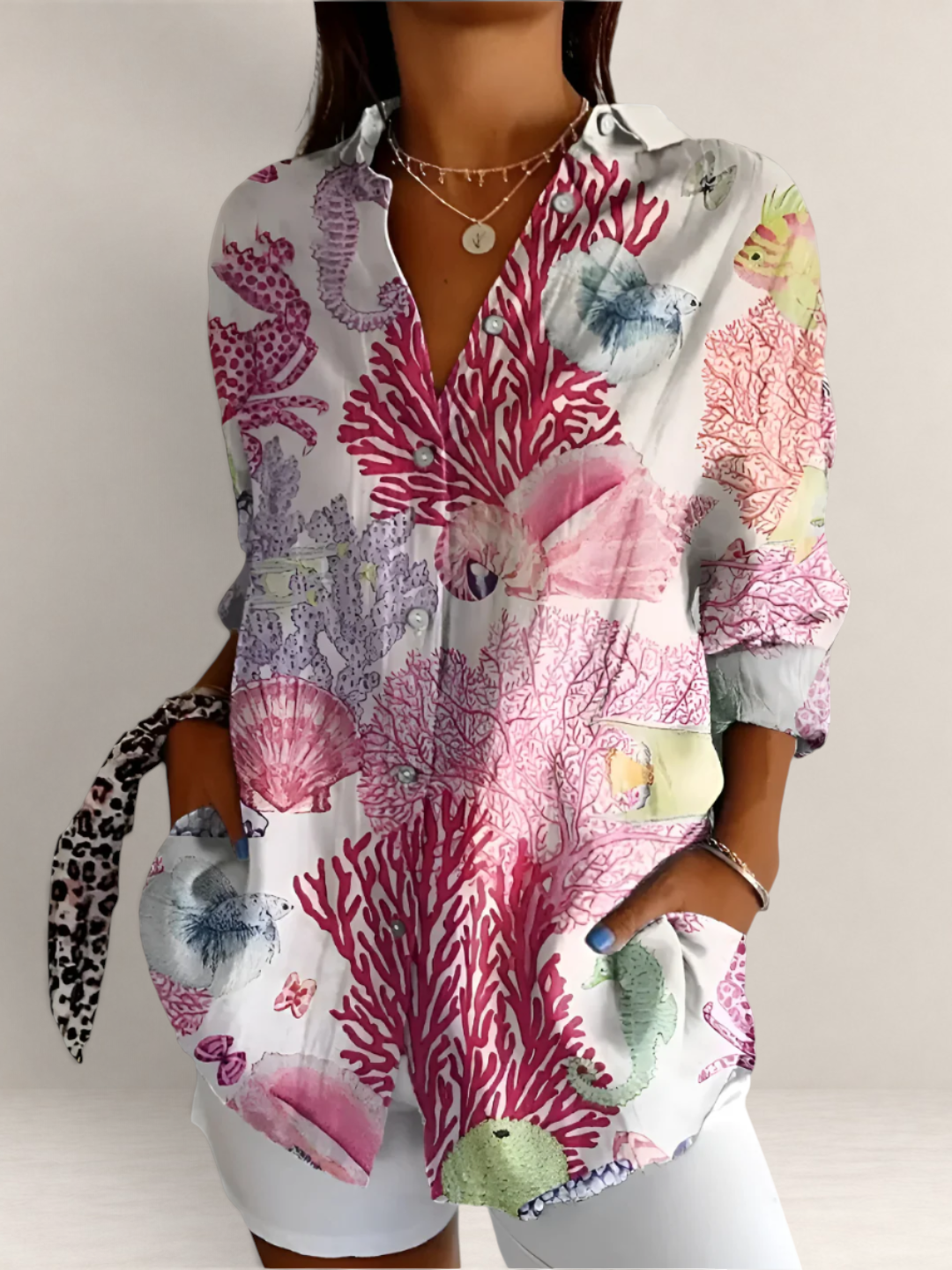 Valvet Oak House white button-down blouse with pink and blue coral reef print, V-neck, and long sleeves.