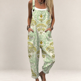 Valvet Oak House Dimitra printed jumpsuit with bee pattern, wide legs, and adjustable straps in light green and yellow
