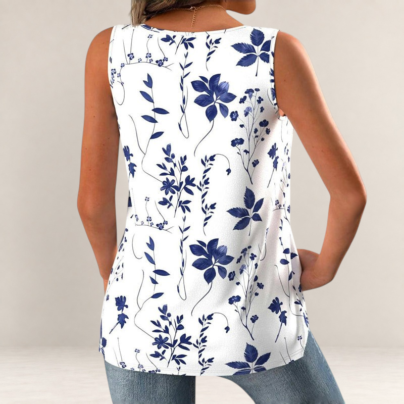 Valvet Oak House sleeveless white top with blue floral pattern, featuring a relaxed fit and V-neck back view.
