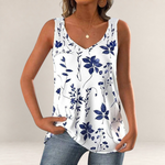 Valvet Oak House white sleeveless tank top with blue floral pattern and V-neckline worn by a woman
