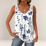 Valvet Oak House white sleeveless tank top with blue floral pattern and V-neckline worn by a woman