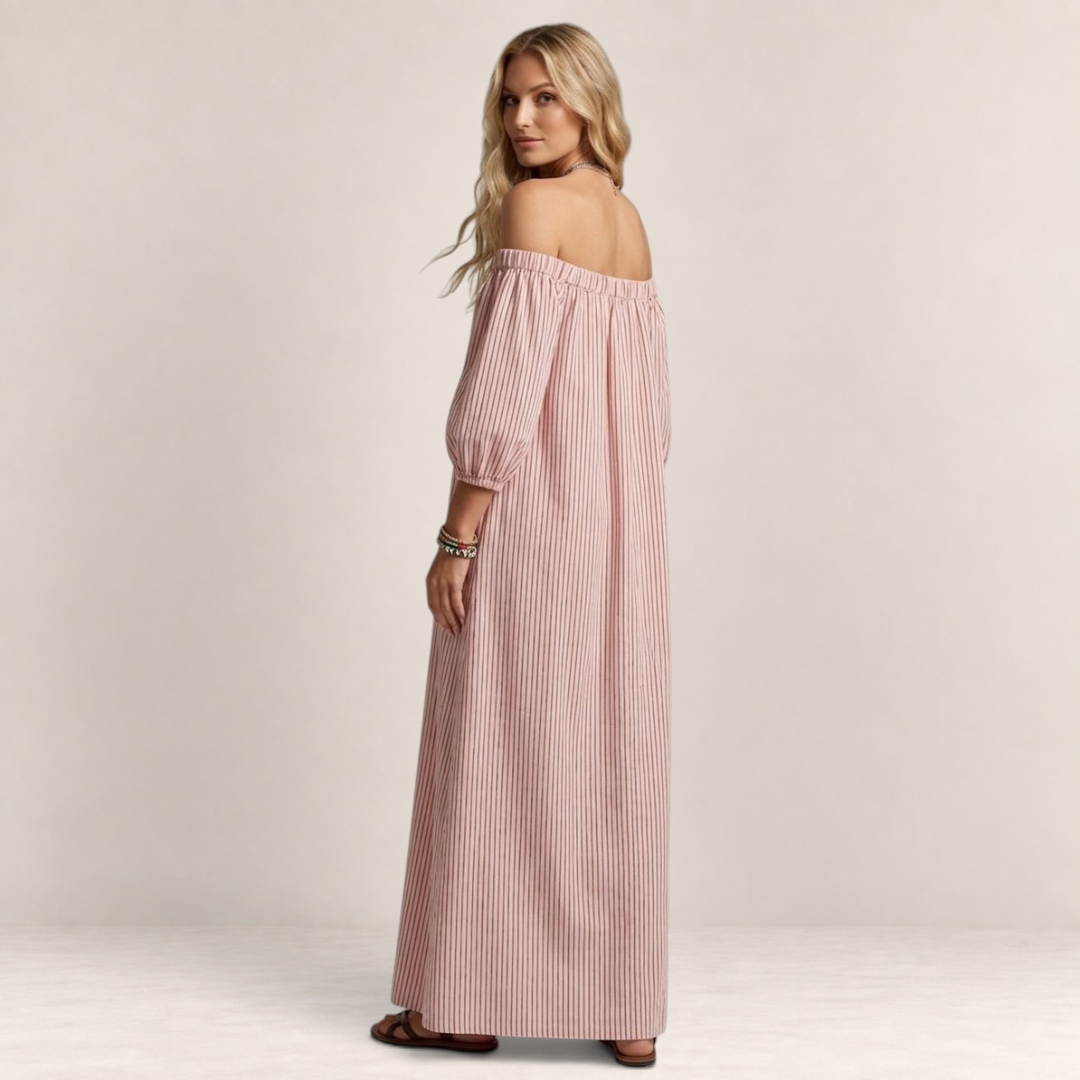Valvet Oak House off-shoulder striped maxi dress in light pink cotton and linen blend worn by a blonde model