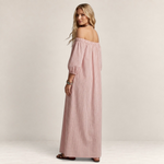 Valvet Oak House off-shoulder striped maxi dress in light pink cotton and linen blend worn by a blonde model