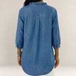 Valvet Oak House Elena denim blouse with ruffled collar and three-quarter sleeves, back view on a model
