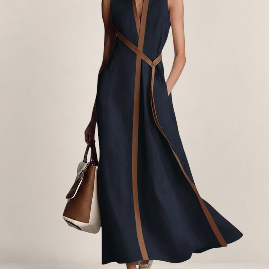 Valvet Oak House navy blue linen blend sleeveless maxi dress with brown trim and stand-up collar on a model