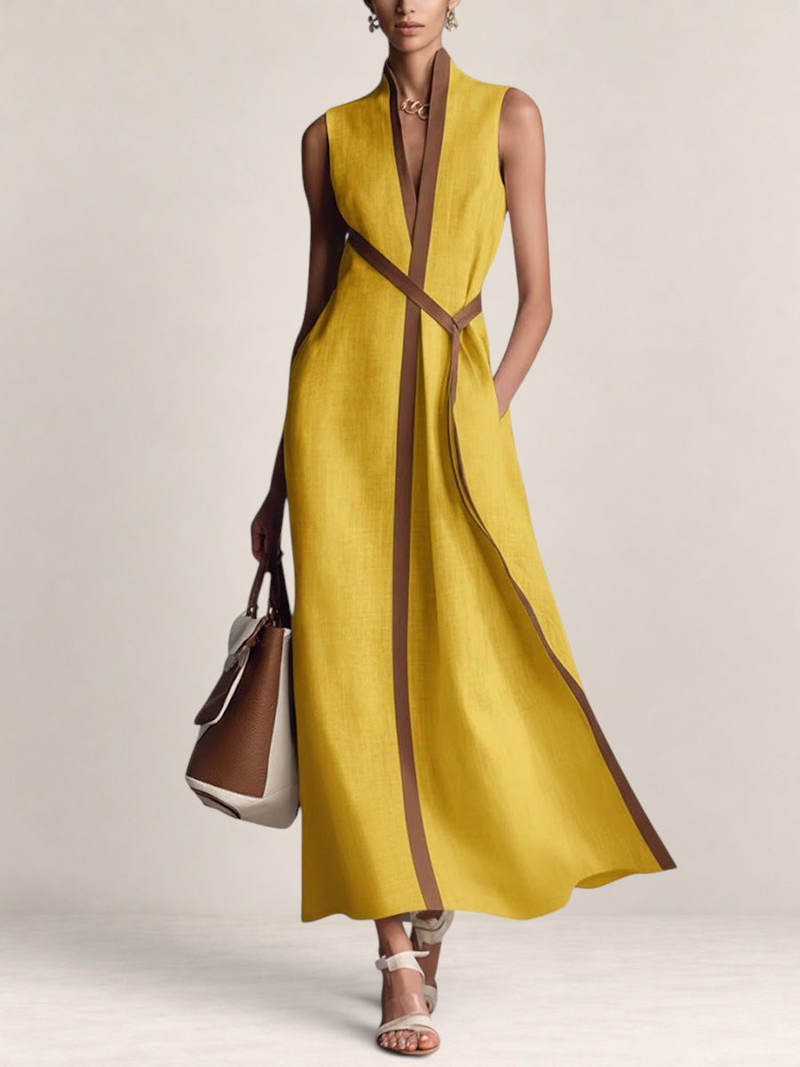 Valvet Oak House yellow linen blend sleeveless maxi dress with brown trim, stand collar, and waist tie.