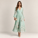 Valvet Oak House Mel midi dress in mint green chiffon with floral print, long sleeves, and pleated skirt detail.