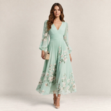 Valvet Oak House Mel midi dress in mint green chiffon with floral print, long sleeves, and pleated skirt detail.