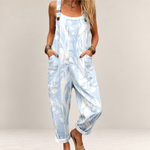 Valvet Oak House Zephyra printed jumpsuit in light blue and white with wide legs, pockets, and adjustable straps.