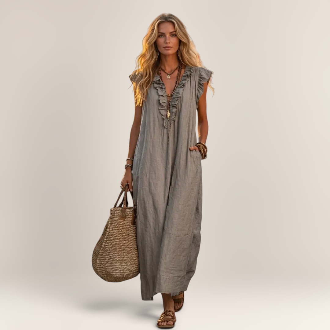 Valvet Oak House grey linen-cotton maxi dress with ruffle details and side pockets worn by a blonde model