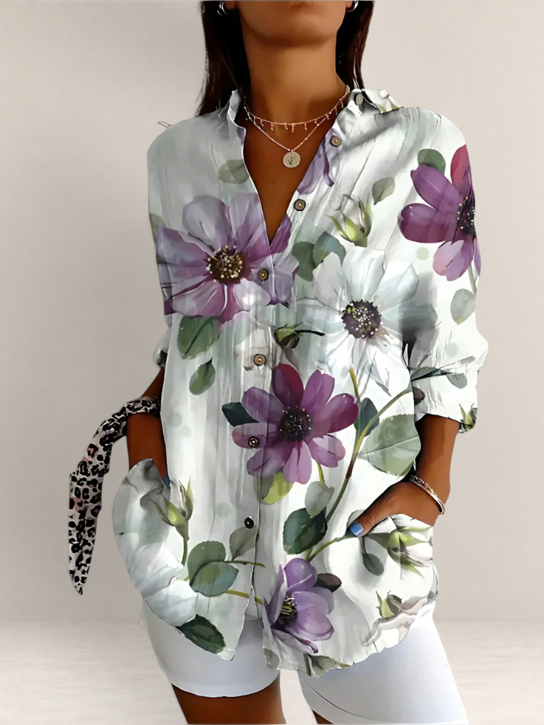 Valvet Oak House floral cotton blouse with V-neck, long sleeves, and purple flower print on a white background.