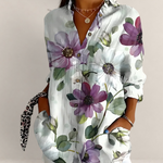 Valvet Oak House floral cotton blouse with V-neck, long sleeves, and purple flower print on a white background.
