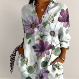 Valvet Oak House floral cotton blouse with V-neck, long sleeves, and purple flower print on a white background.