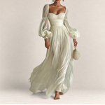 Valvet Oak House romantic cream maxi dress with sheer puff sleeves, sweetheart neckline, and flowing airy silhouette.