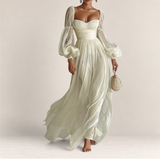Valvet Oak House romantic cream maxi dress with sheer puff sleeves, sweetheart neckline, and flowing airy silhouette.