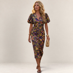 Valvet Oak House midi dress with V-neck, puff sleeves, and a vibrant purple and green abstract animal print pattern.