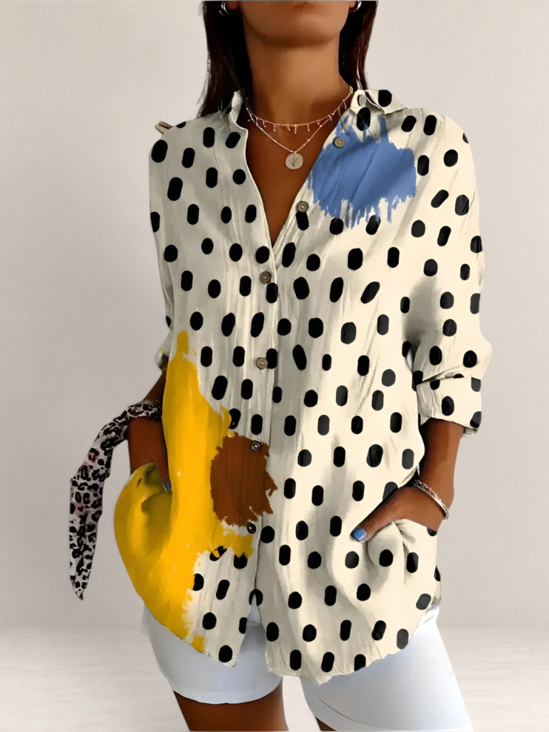 Valvet Oak House button-down blouse with black polka dots and yellow and blue paint splatter accents