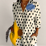 Valvet Oak House button-down blouse with black polka dots and yellow and blue paint splatter accents