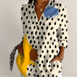 Valvet Oak House button-down blouse with black polka dots and yellow and blue paint splatter accents