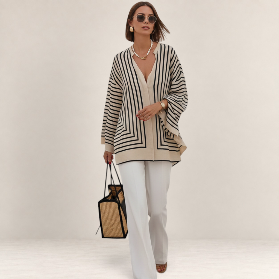 Valvet Oak House Thetis striped blouse with a flowing silhouette, V-neck, and long sleeves in beige and black.