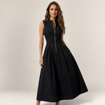 Valvet Oak House Zoe elegant black sleeveless midi dress with a front zipper and pleated skirt on a model
